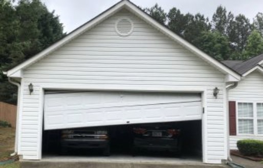 off track garage door repair St. Louis MO